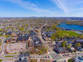 Arlington historic town center aerial view on Massachusetts Avenue at Mystic Street and Broadway with Boston at the background, Arlington, Massachusetts MA, USA. 