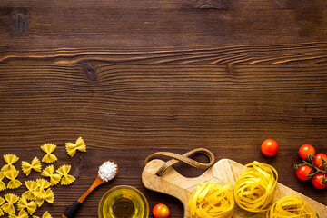 Obraz na płótnie Canvas Frame of fettuccine with ingredients for cooking italian pasta