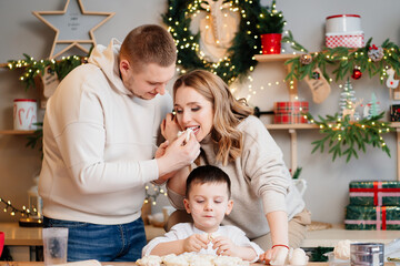 happy family together prepares traditional dishes dumplings and eat the filling
