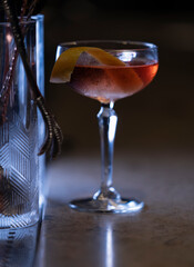 Delicious elegant orange cocktail in top bar restaurant in bogota colombia