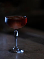 Delicious elegant orange cocktail in top bar restaurant in bogota colombia