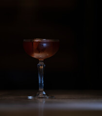 Delicious elegant orange cocktail in top bar restaurant in bogota colombia