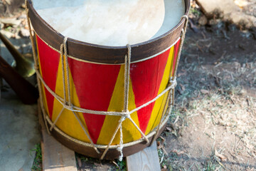 drum military red and yellow for knocking out a march close-up