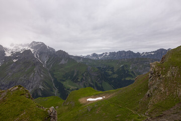 Amazing hiking day in the hearth of Switzerland. Wonderful scenery while climbing the summit and watching over the alps. Epic landscape.