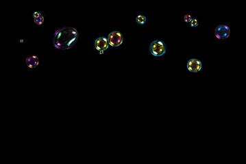 Soap bubbles isolated on a black background