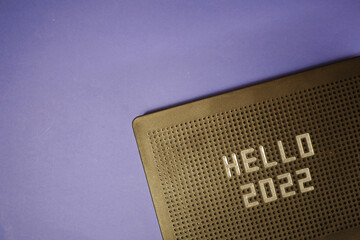 Hello 2022 greeting on message board. Flat lay. New Year celebration