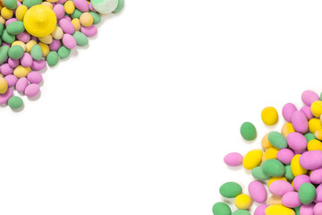 Colorful meringues and glazed peanuts isolated on a white background.