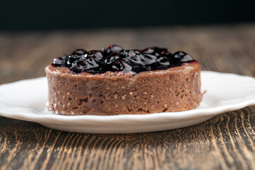 cake with butter cream and black currant jam