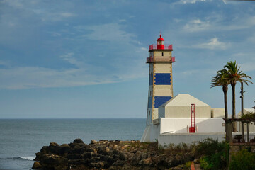 Lighthouse of Santa Marta in Cascais (Portugal) at sunset