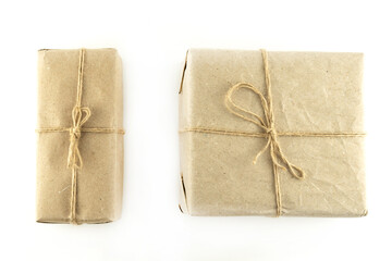 pair of craft giftbox in brown paper on isolated background