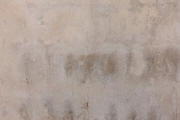 Old concrete white-brown-cream wall textures for background with cracks textures	