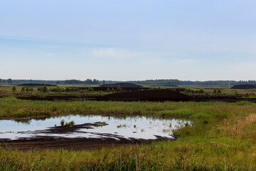 the flooded area where peat is extracted