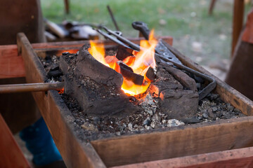 fire burns in the forge forge preparation for forging metal
