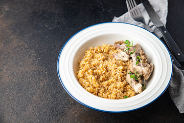 wheat porridge with boiled chicken meat, healthy food fresh portion ready to eat meal snack on the table copy space food background rustic. top view keto or paleo diet