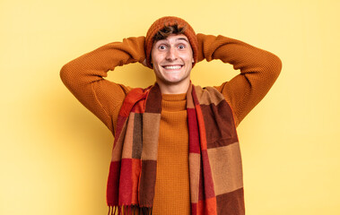 young teenager boy feeling stressed, worried, anxious or scared, with hands on head, panicking at...