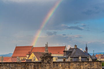 Rainbow over the stunning old city center of Bamberg, Upper Franconia, Germany. One of Germany's most beautiful towns and a UNESCO World heritage site