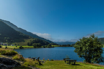 Obraz premium clouds and high mountains around Etne Norway,