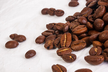 Natural background for Cafe menu or brochure template - macro photo of brown roasted coffee beans, close up