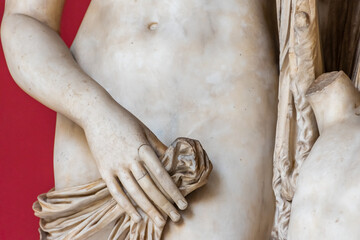 Close-up on female naked belly of marble sculpture