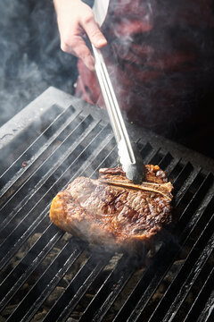 Preparing grilled meat on brazier