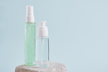 cosmetic bottles, a bottle with gel and perfume
