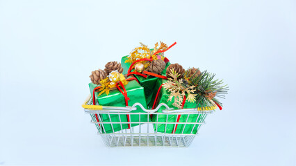 New Year's gifts in a basket on a white background