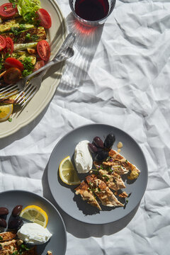 Fried fish with olives and sauce