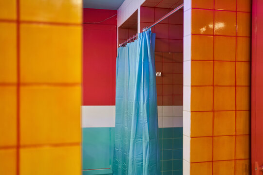 Interior of colorful public bathroom