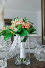 bouquet in the hands of the bride