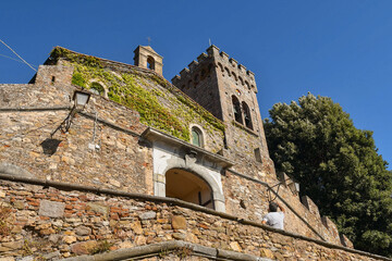 Low-angle view of the Castle of Castagneto Carducci, built by the Counts of Gherardesca in the year 1000, belongs to the family for 34 generations