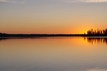 Obraz na płótnie Canvas Colourful Sunset at Astotin Lake, Elk Island National Park