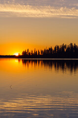 Fototapeta premium Colourful Sunset at Astotin Lake, Elk Island National Park