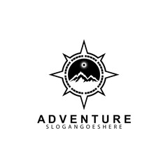 Fototapeta premium Mountain adventure logo design. Compass icon symbol