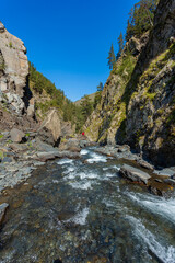 Mountain river among the rocks in Tusheti, travel across Georgia
