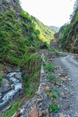 Fototapeta na wymiar Dangerous mountain road in Tusheti, travel across Georgia