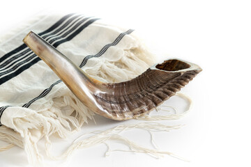 Нom Kippur. Tallit, shofar on a white background. Isolated
