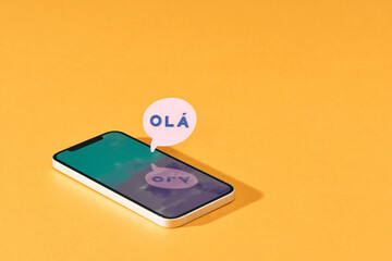 mobile phone with OlÃ¡ in chat box