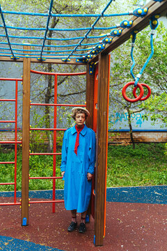 Woman in vintage blue cloak