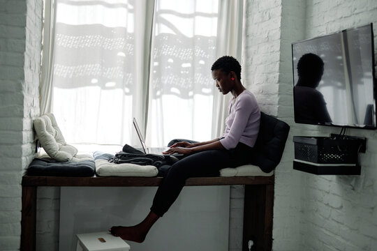 Female worker completing tasks from home 