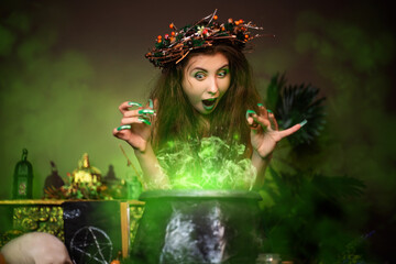 A witch with disheveled hair and long nails with a wreath of dry branches on her head, dressed in a...