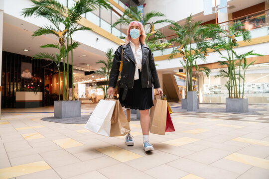 Woman Walking At Shopping Mall Hall
