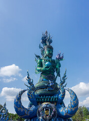 Sculpture of Blue Guardian from Wat Rong Suer Ten, also known as Blue Temple in Chiang Rai, Thailand