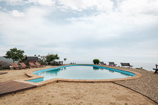 Swimming pool in a rural backyard with height views 