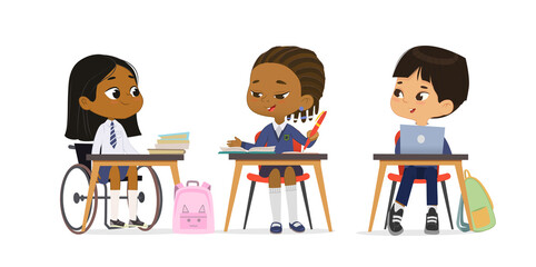 Happy elementary pupils at lesson diversity inclusion education class talking together vector flat illustration. Cute girl in wheelchair wearing school uniform greeting multiracial classmates isolated - obrazy, fototapety, plakaty