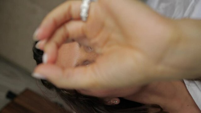 seductive girl sexually touches her face with her hands, flirting with the camera. High quality FullHD footage