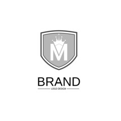 letter M and crown design logo template in shield,