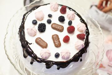 Tasty birthday fruit cake with chocolate.