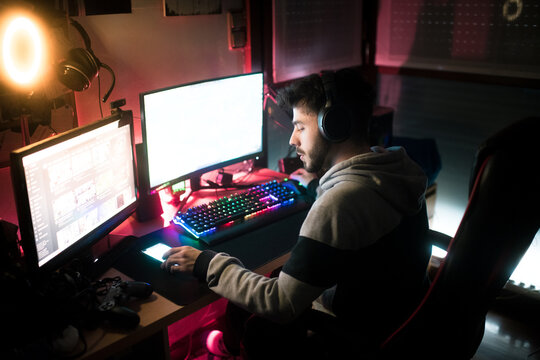 Young gamer checking his phone