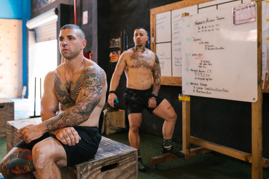 Trainer teaching the class in the gym