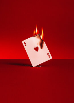 Poker card on flames.